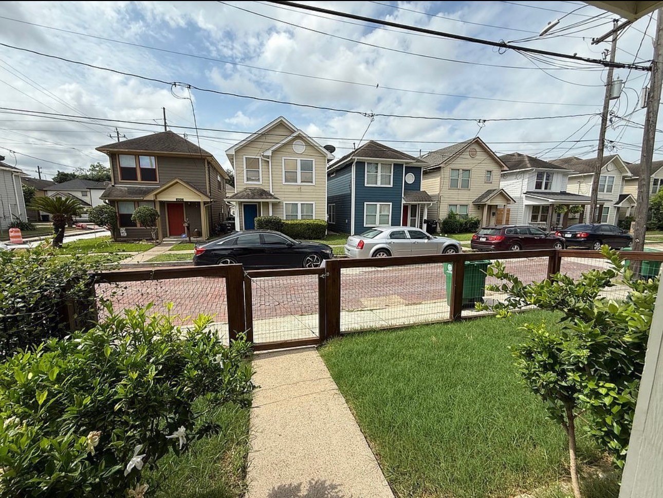1204 Andrews Street Houston, TX 77019 - Photo 15 of 15 a front view of a house with a yard