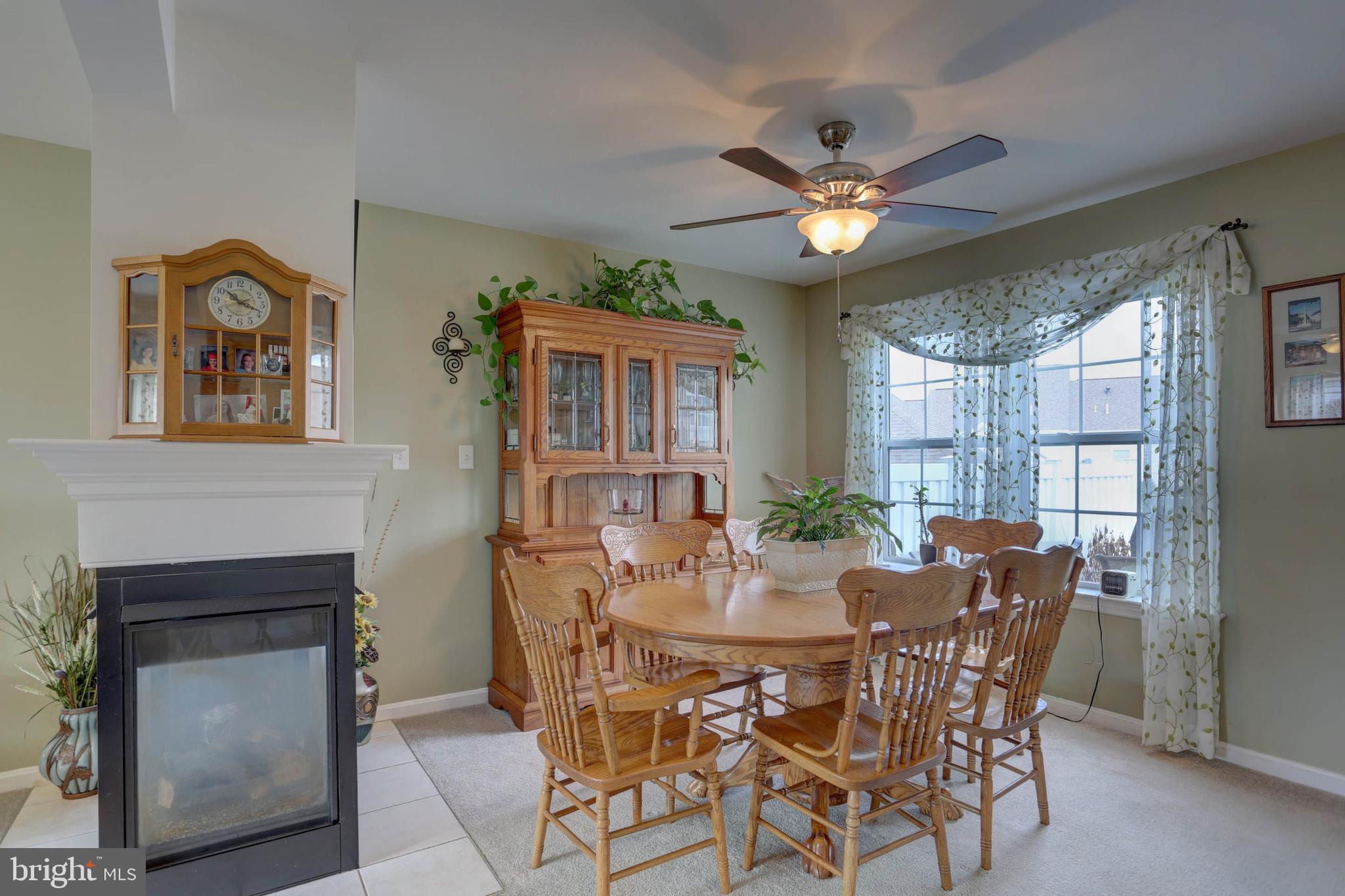 656 Chatham Way Lititz, PA 17543 - Photo 7 of 36 Dining room with gas fireplace