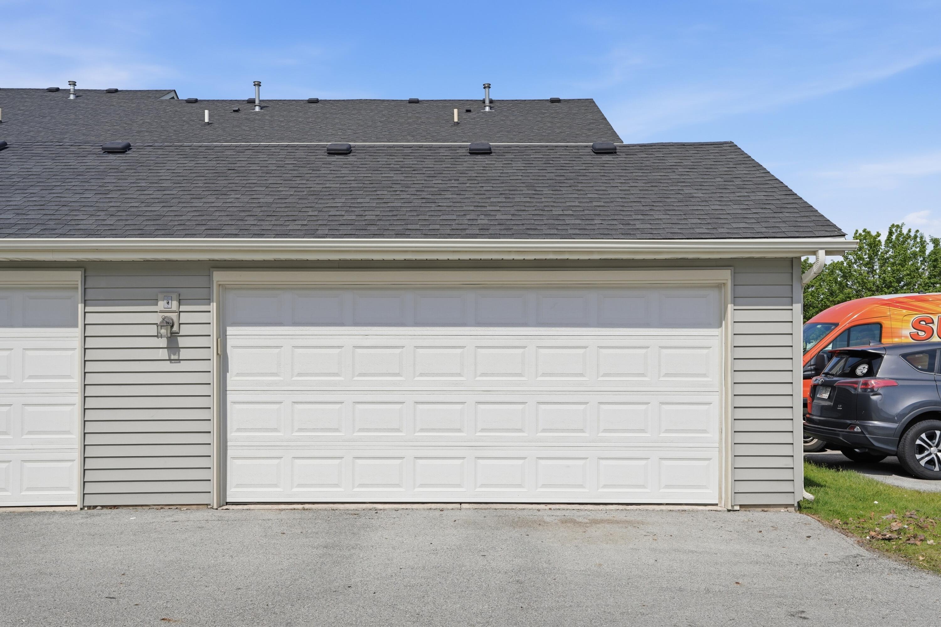 11351 Rhode Island Street Crown Point, IN 46307 - Photo 17 of 18 front view of a house with a garage