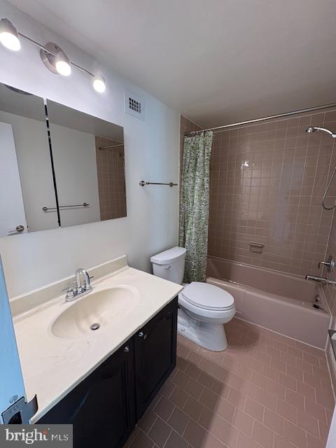 1200 North Nash Street, Unit 1155 Arlington, VA 22209 - Photo 15 of 23 a bathroom with a sink a toilet and shower
