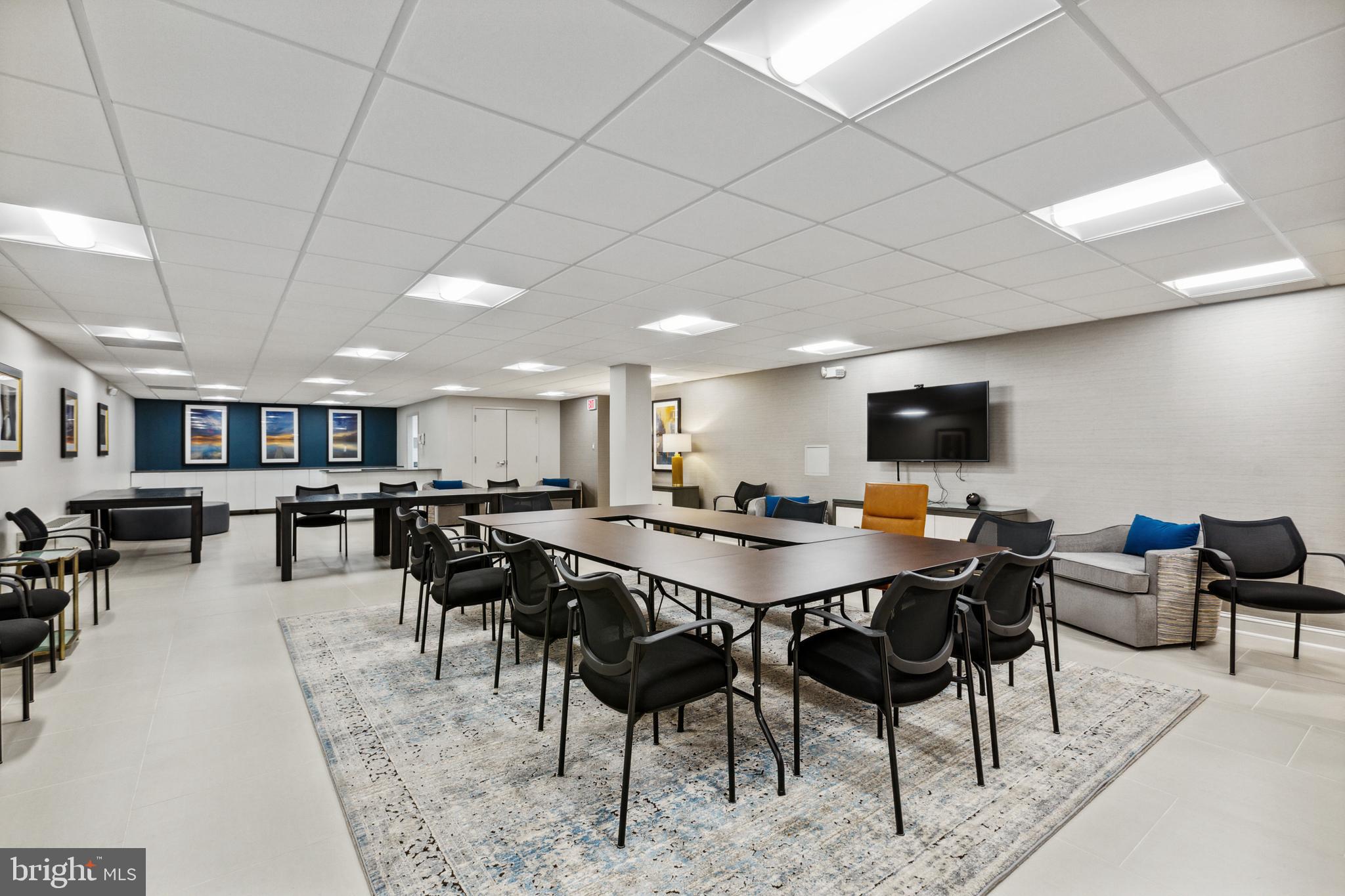 1200 North Nash Street, Unit 1155 Arlington, VA 22209 - Photo 19 of 23 a view of a dining room with furniture