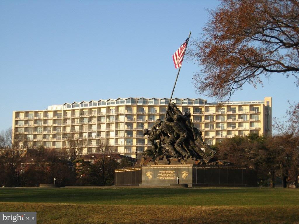 1200 North Nash Street, Unit 1155 Arlington, VA 22209 - Photo 3 of 23 a front view of a building with lake view