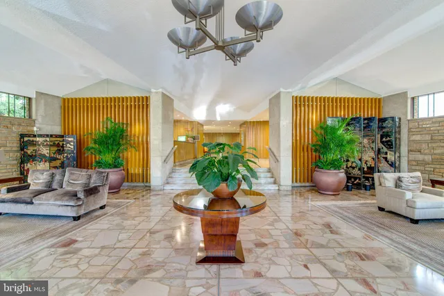a view of a livingroom with furniture window and outside view