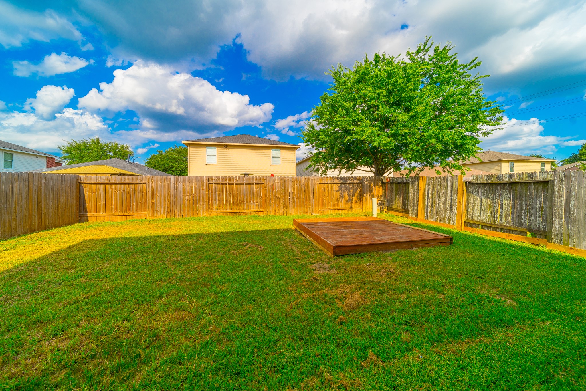 22802 Sherioaks Lane Spring, TX 77389 - Photo 20 of 21 a view of a house with a backyard