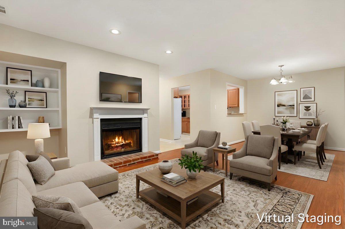 10110 Oakton Terrace Road, Unit 10110 Oakton, VA 22124 - Photo 2 of 24 Virtually Staged Main Living/Dining