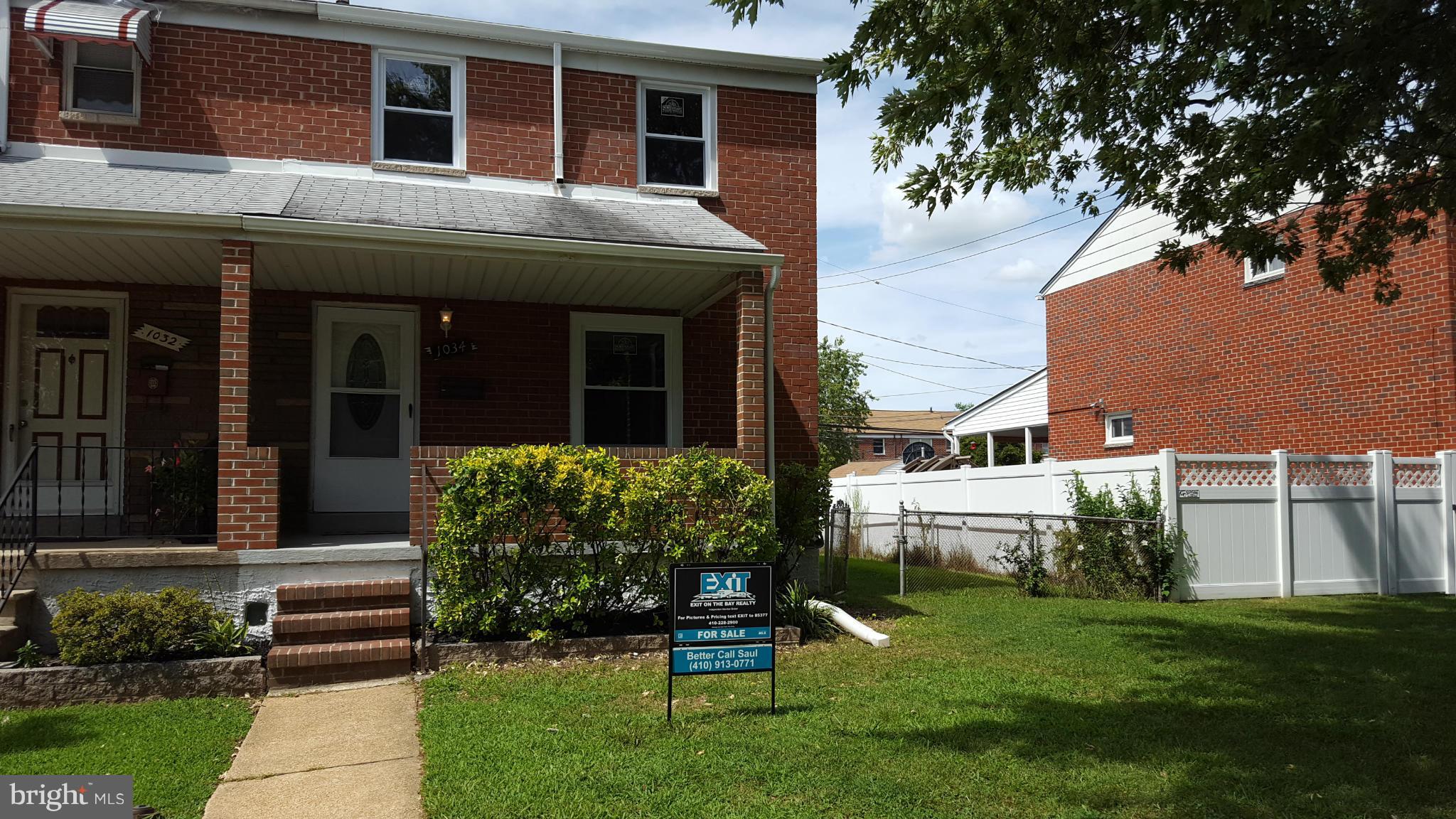 1034 Middleborough Road Baltimore, MD 21221 - Photo 1 of 29 a front view of a house with a yard