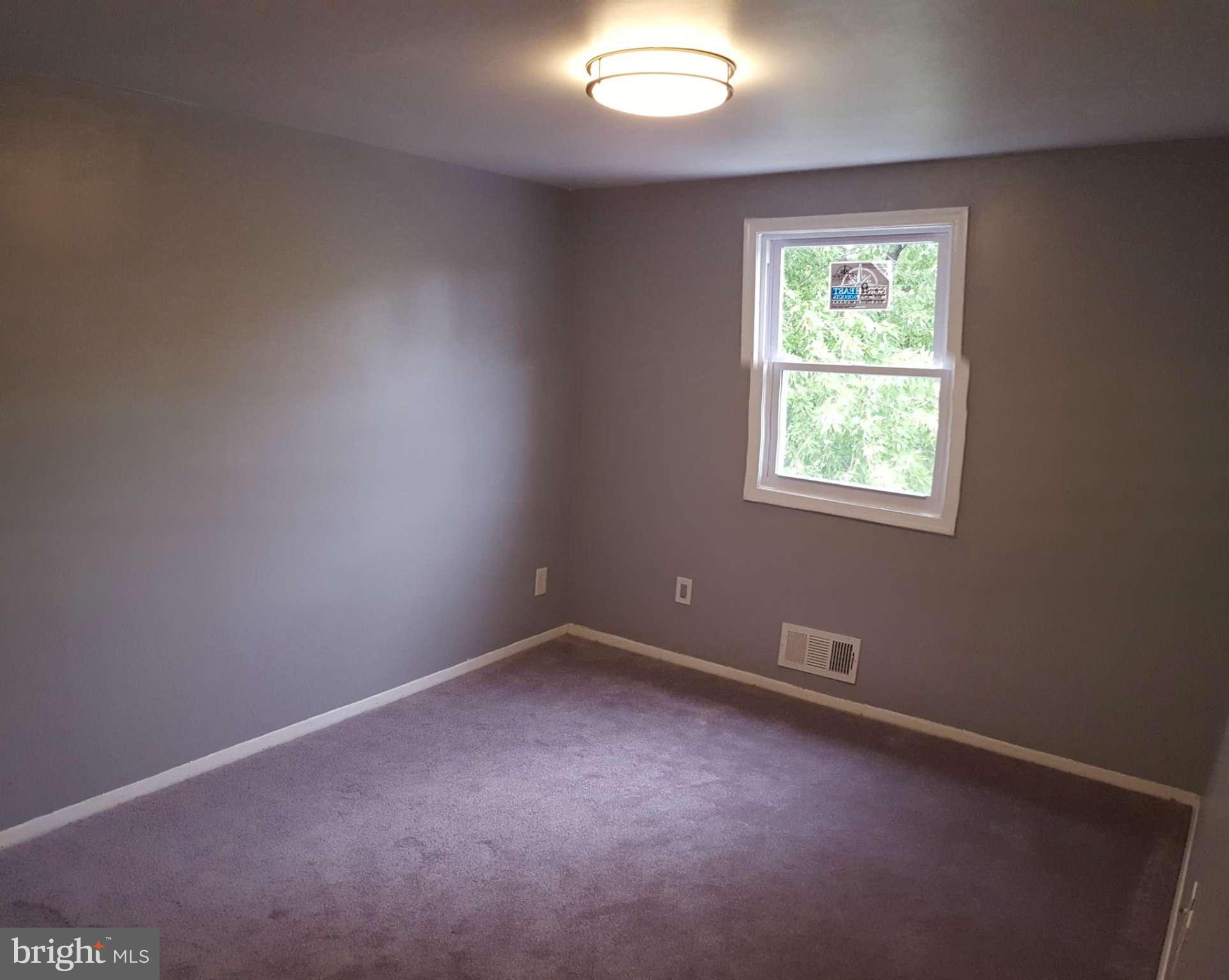 1034 Middleborough Road Baltimore, MD 21221 - Photo 21 of 29 an empty room with a window