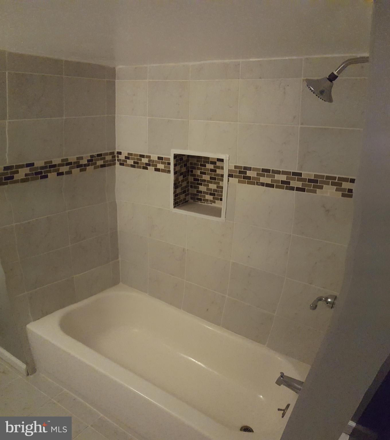 1034 Middleborough Road Baltimore, MD 21221 - Photo 26 of 29 a bathroom with a bathtub