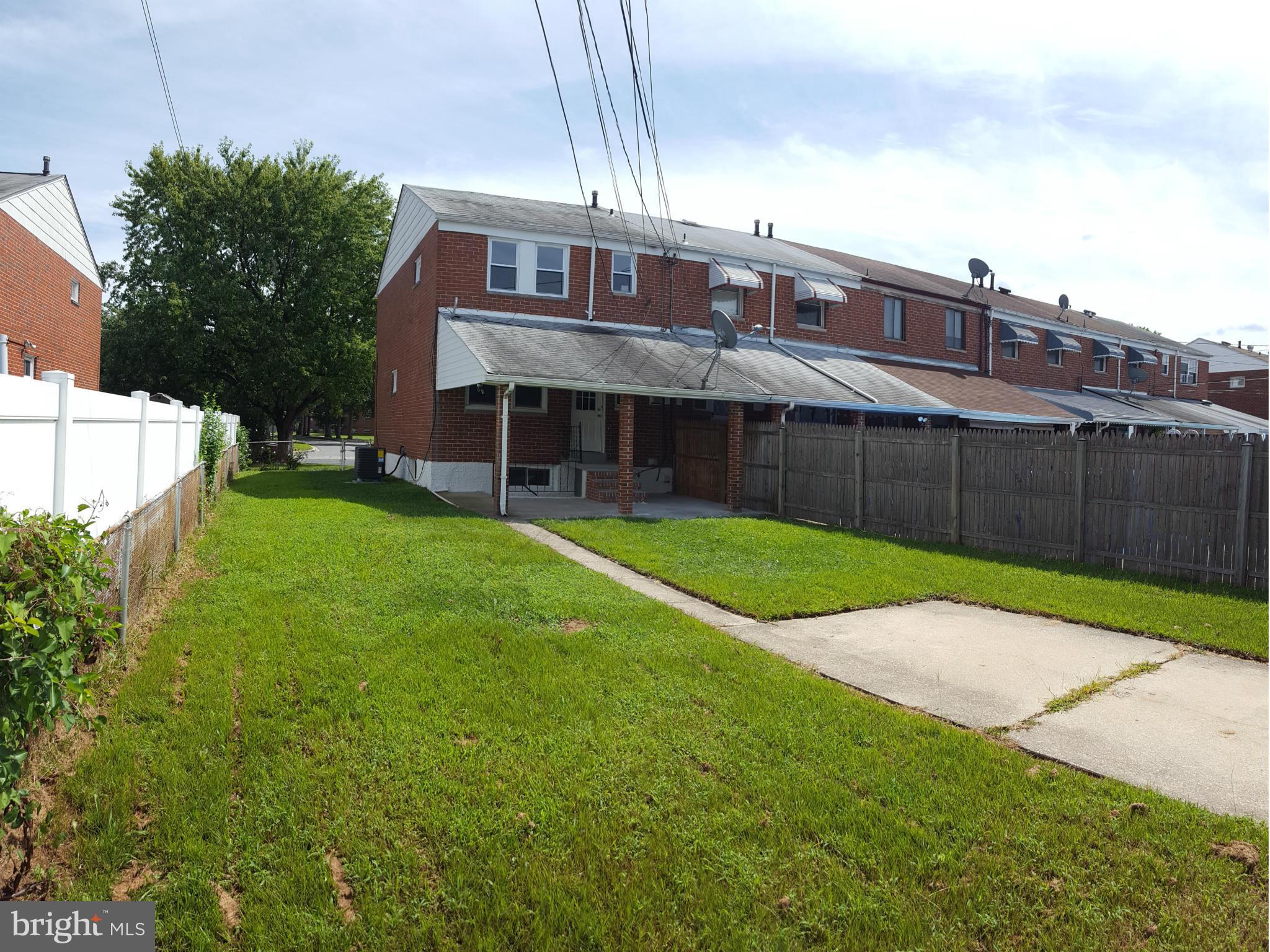1034 Middleborough Road Baltimore, MD 21221 - Photo 29 of 29 a view of a house with a big yard plants and large trees