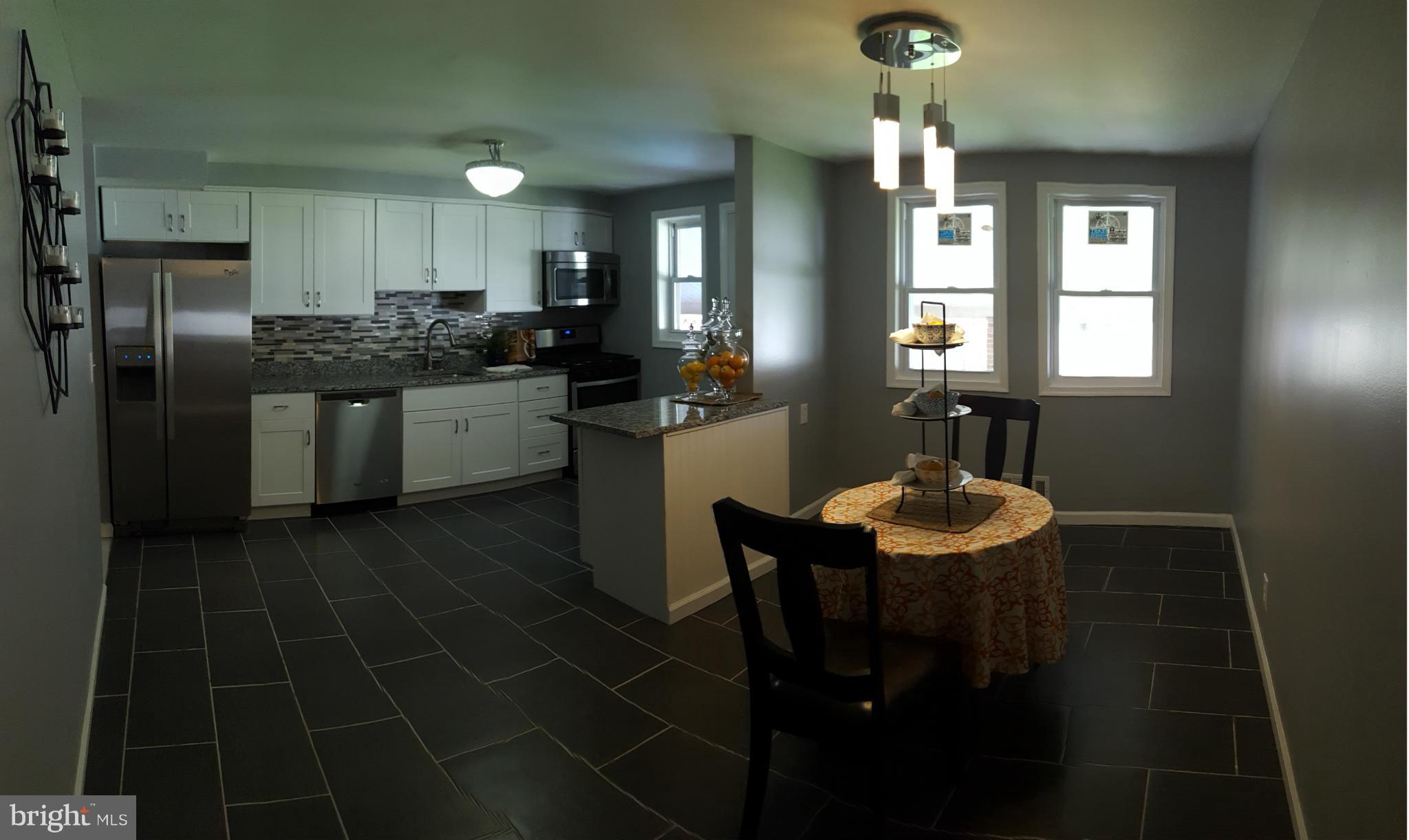 1034 Middleborough Road Baltimore, MD 21221 - Photo 6 of 29 a kitchen with a sink stainless steel appliances and cabinets