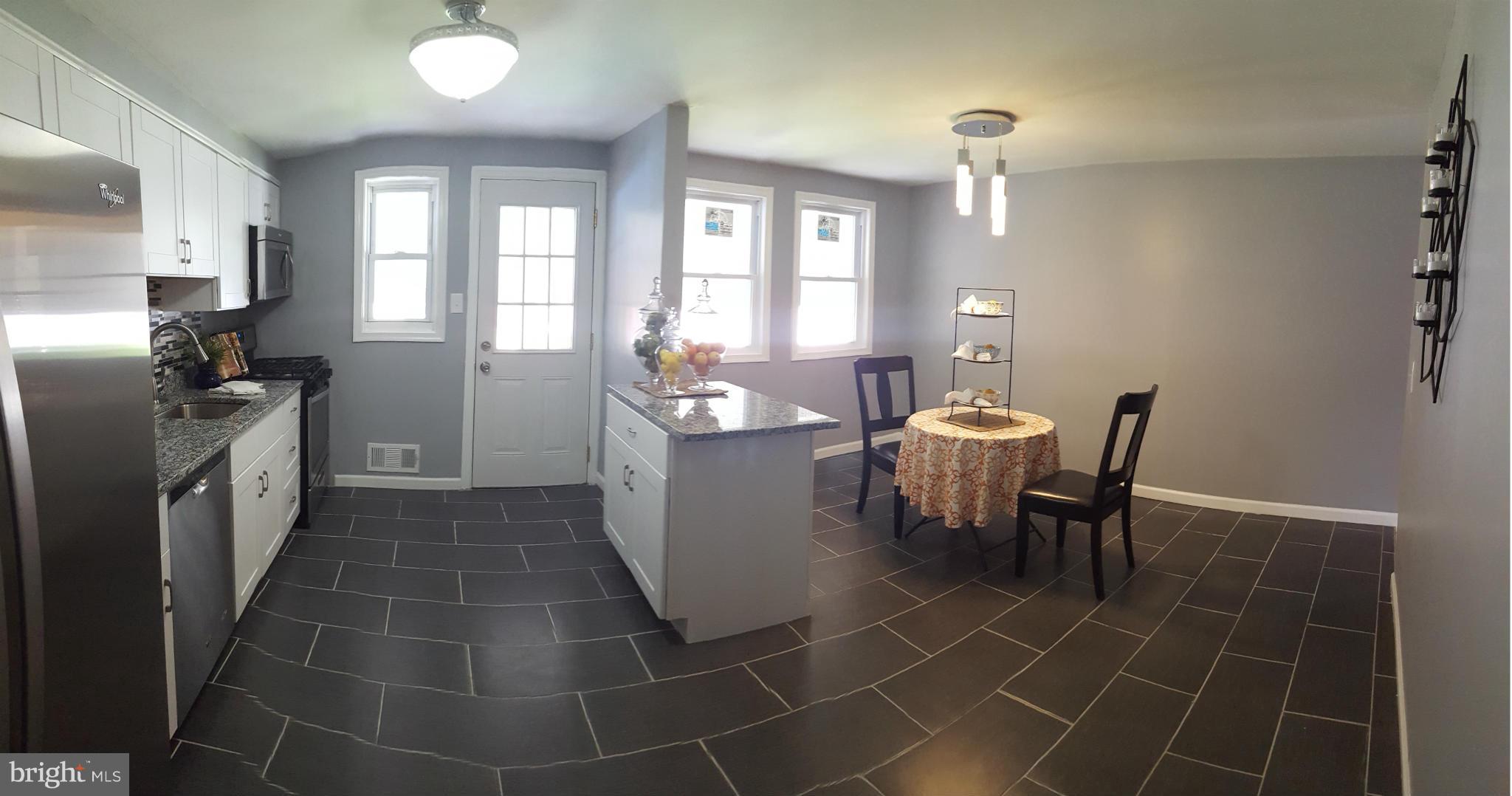 1034 Middleborough Road Baltimore, MD 21221 - Photo 7 of 29 a dining room with furniture and window