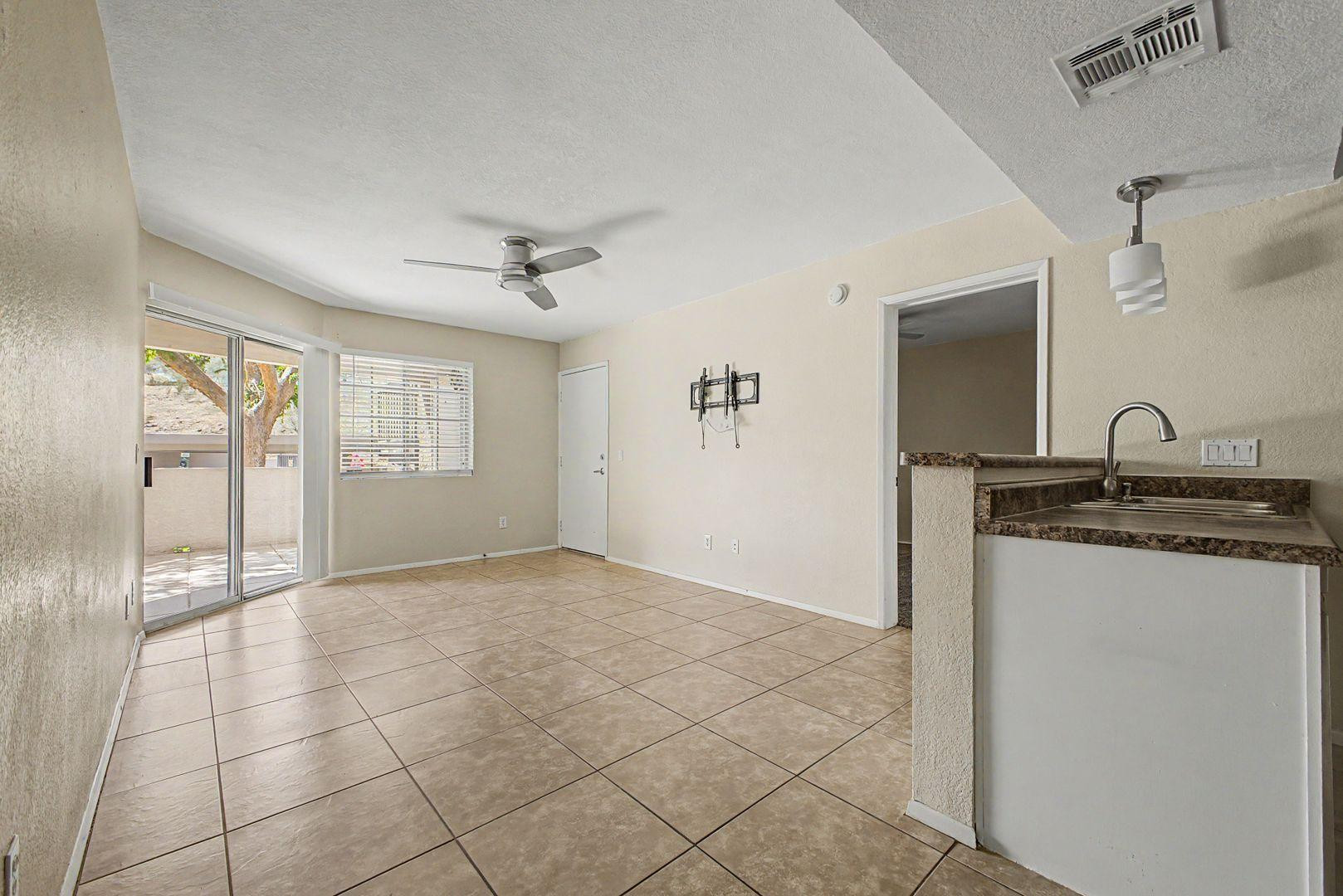 1720 East Thunderbird Road, Unit 1086 Phoenix, AZ 85022 - Photo 5 of 32 a view of an empty room and window
