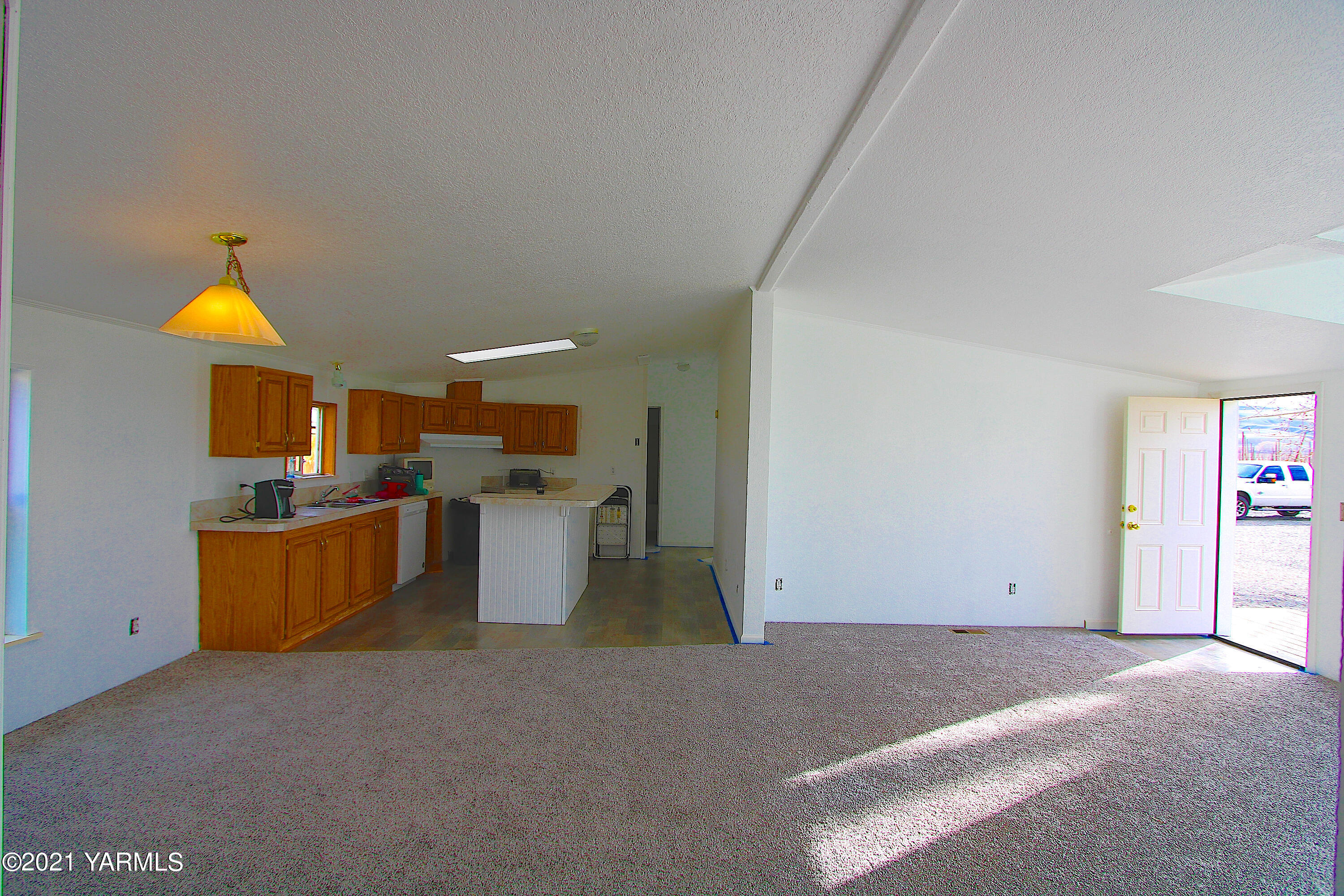 731 South Rivard Road Moxee, WA 98936 - Photo 4 of 26 a kitchen with a sink and a stove top oven