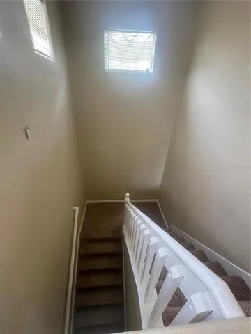 a view of entryway with stairs