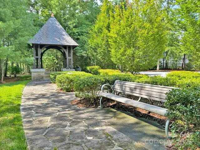 a view of a pathway both side of flower center