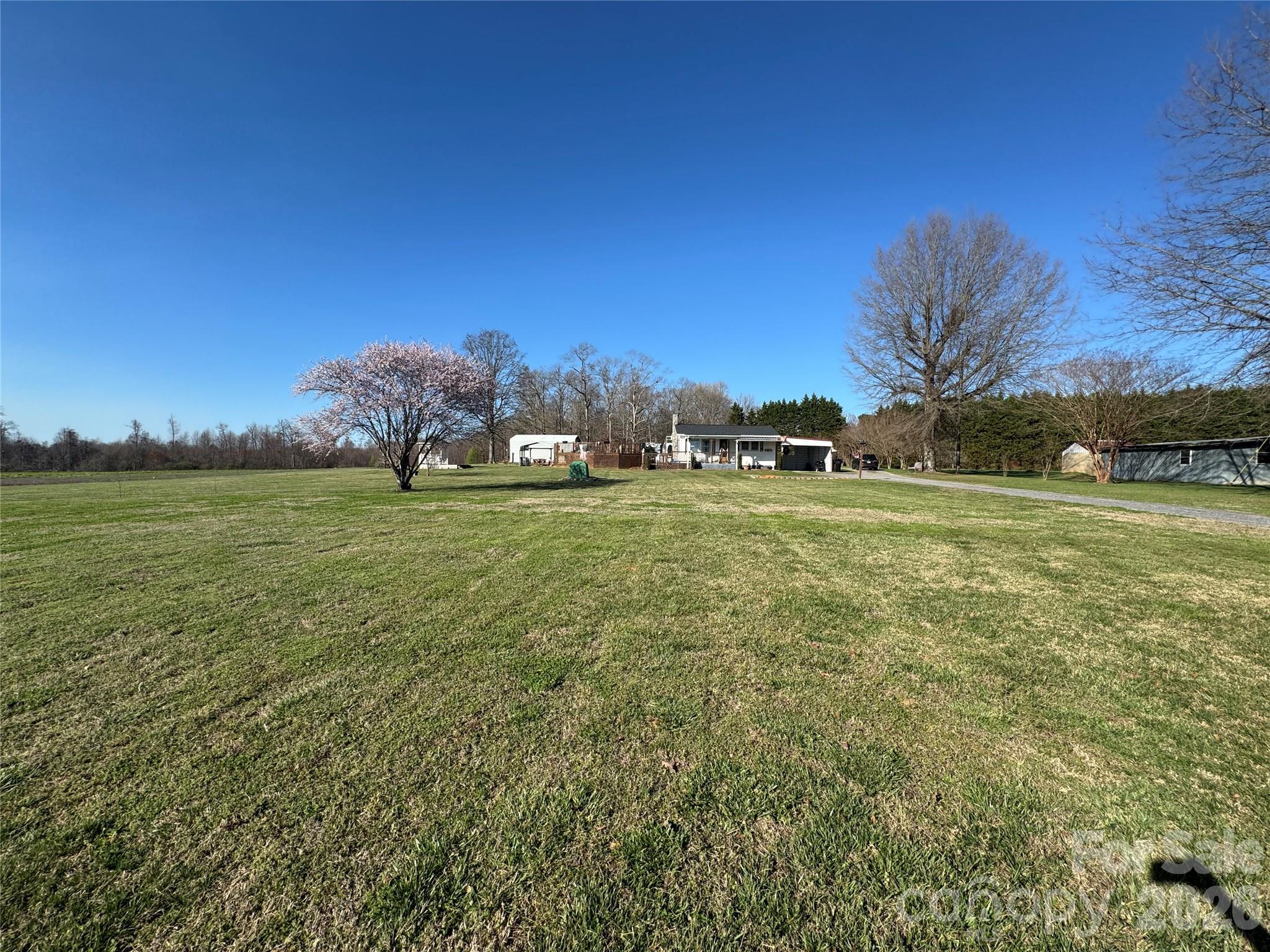 824 Baxter Road Cherryville, NC 28021 - Photo 2 of 13 a view of a field with an trees