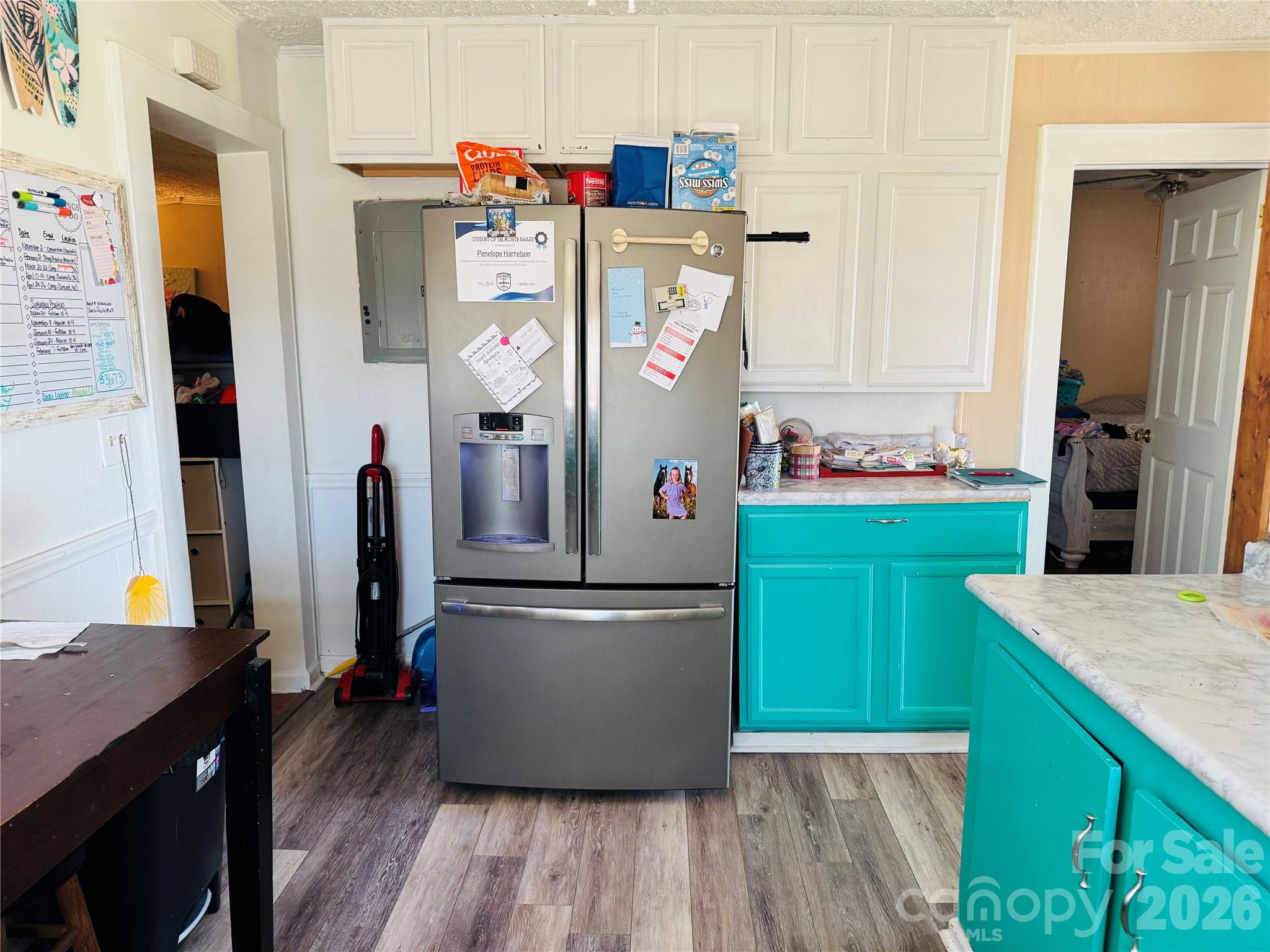824 Baxter Road Cherryville, NC 28021 - Photo 10 of 13 a kitchen with refrigerator and cabinets