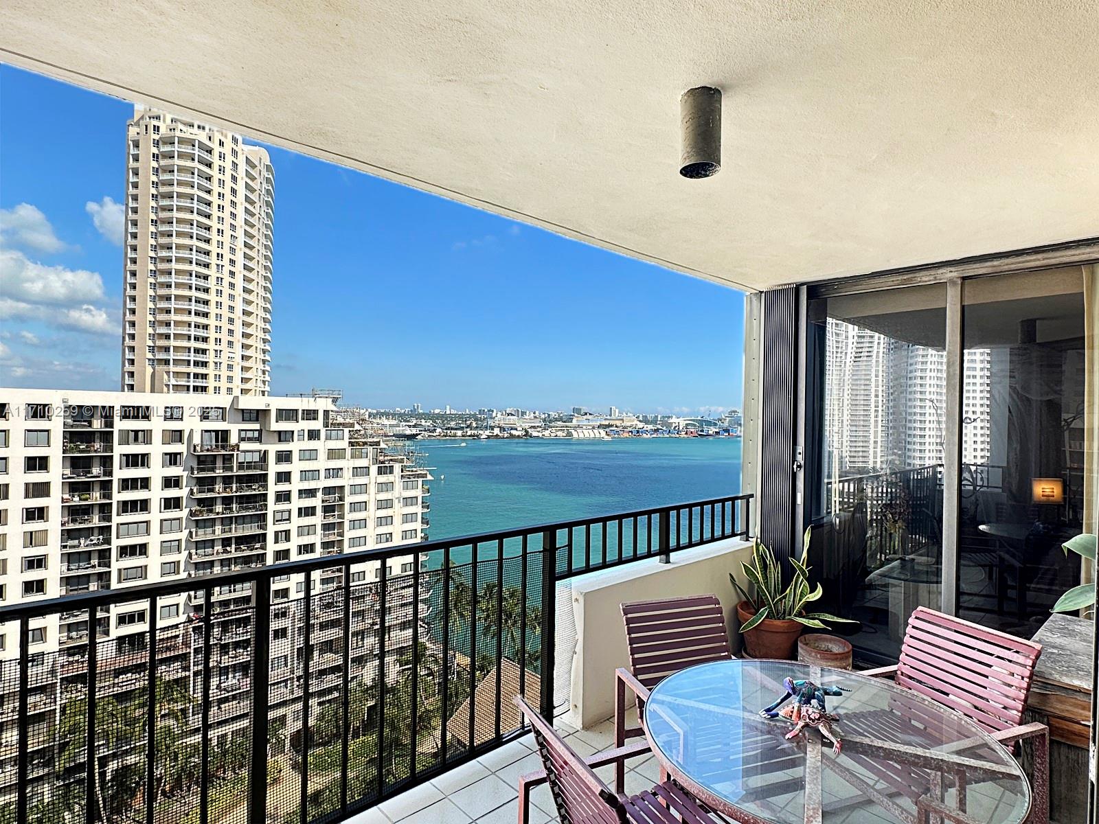 520 Brickell Key Drive, Unit A1802 Miami, FL 33131 - Photo 2 of 35 a balcony view with a couch