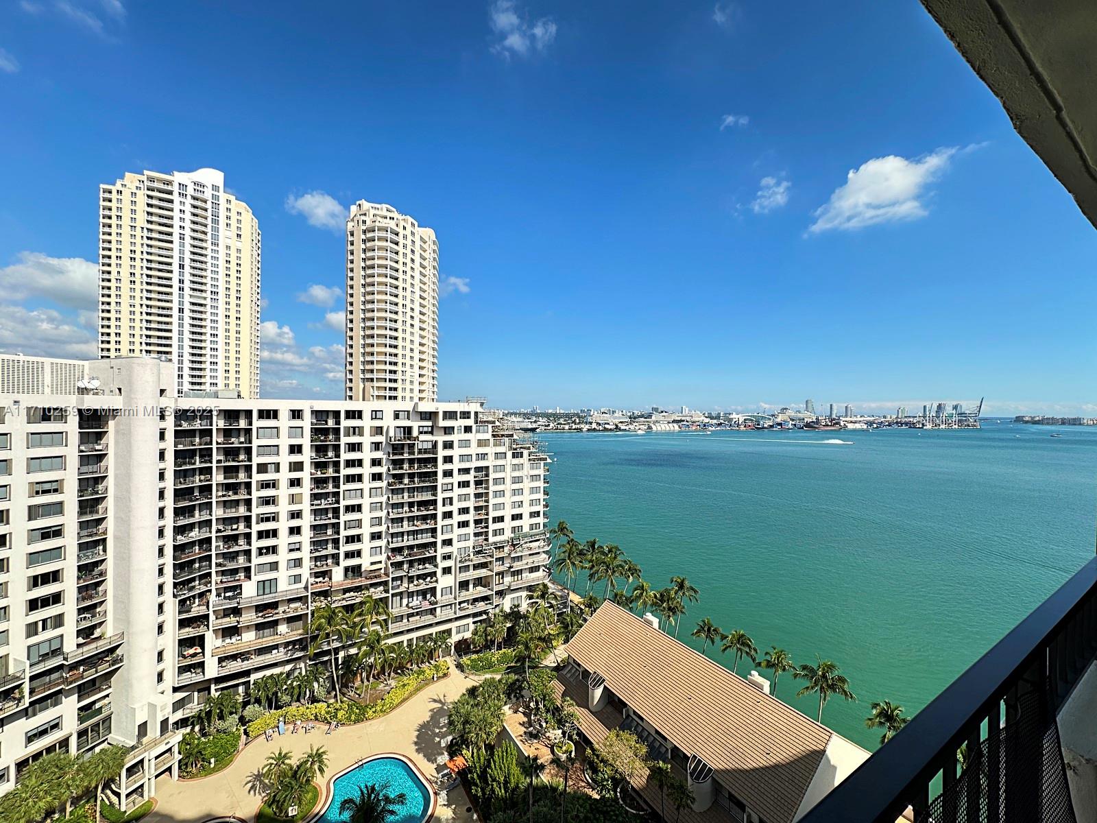 520 Brickell Key Drive, Unit A1802 Miami, FL 33131 - Photo 3 of 35 a view of a balcony with two chairs