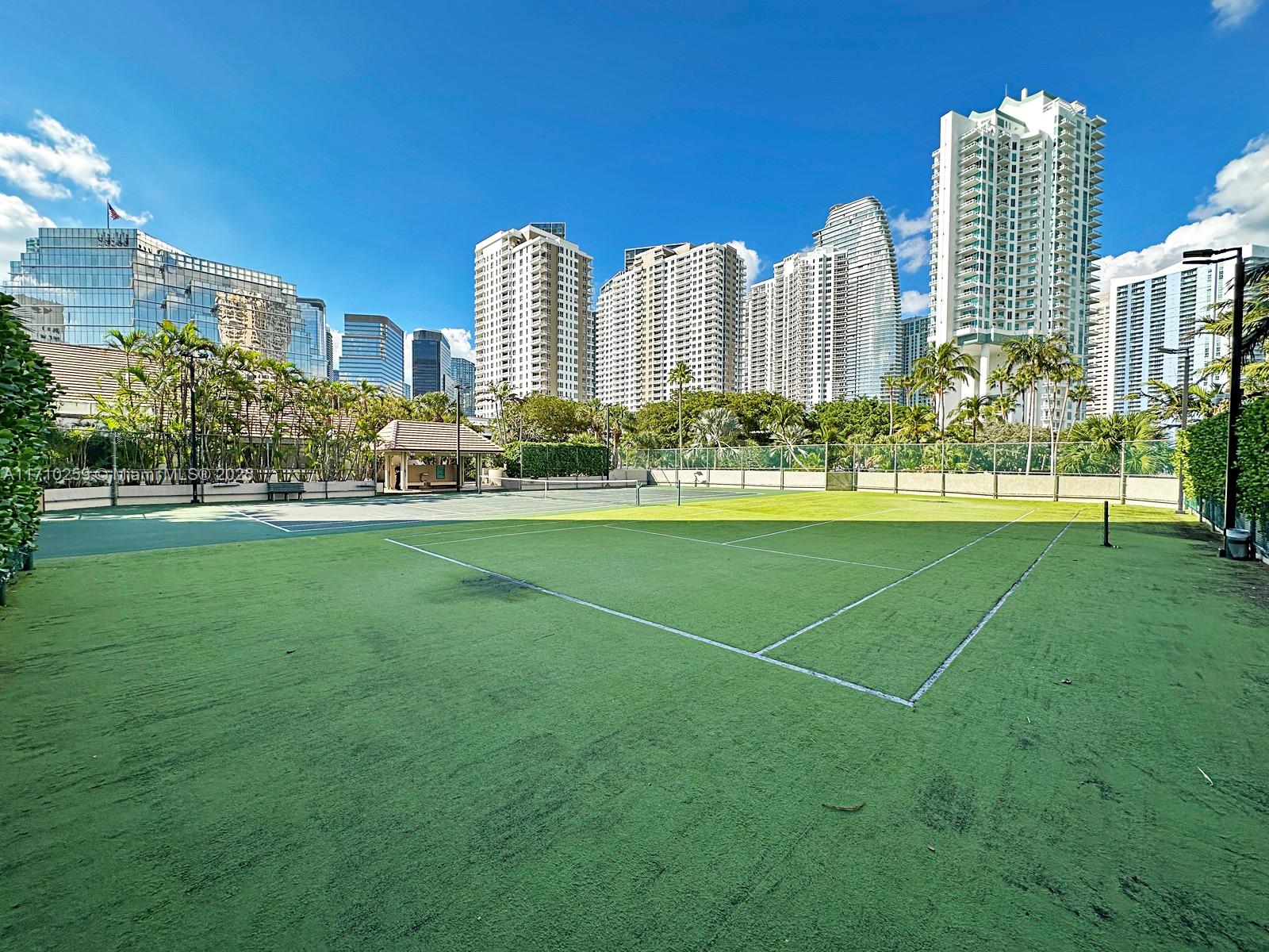 520 Brickell Key Drive, Unit A1802 Miami, FL 33131 - Photo 31 of 35 a view of a city with tall buildings and a big yard