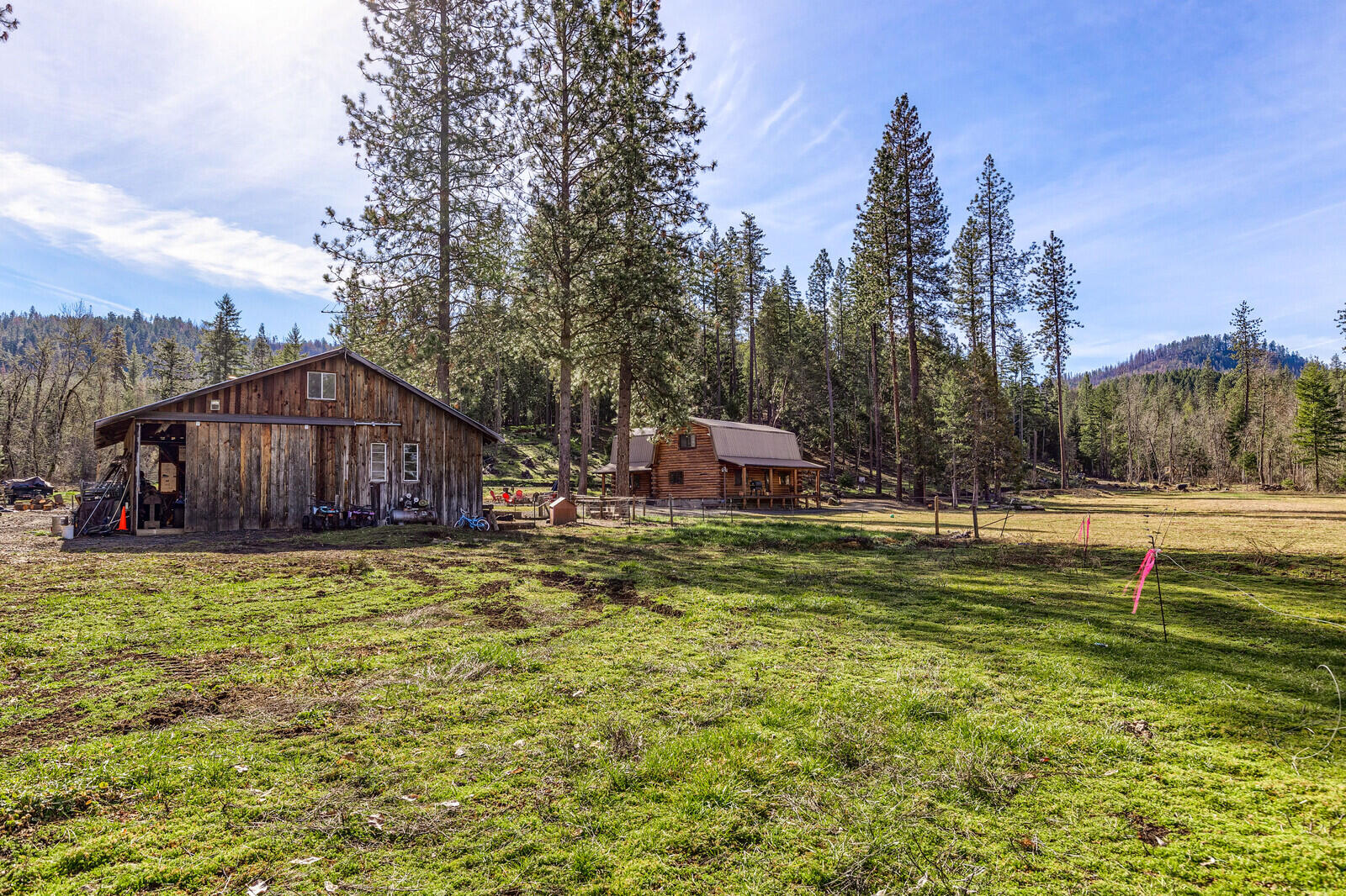 1501 North Obenchain Road Eagle Point, OR 97524 - Photo 65 of 68 a swimming pool with wooden fence