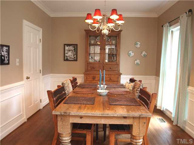 8305 Mourning Dove Road Raleigh, NC 27615 - Photo 2 of 24 Dining Room has hardwood floors and extensive moldings Dining Room