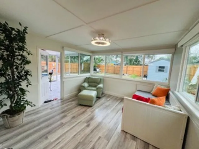 a bedroom with bed and window