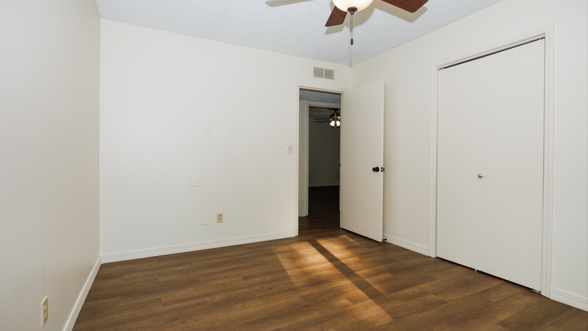 800 West Hamilton Street Atlanta, IL 61723 - Photo 24 of 44 wooden floor in an empty room