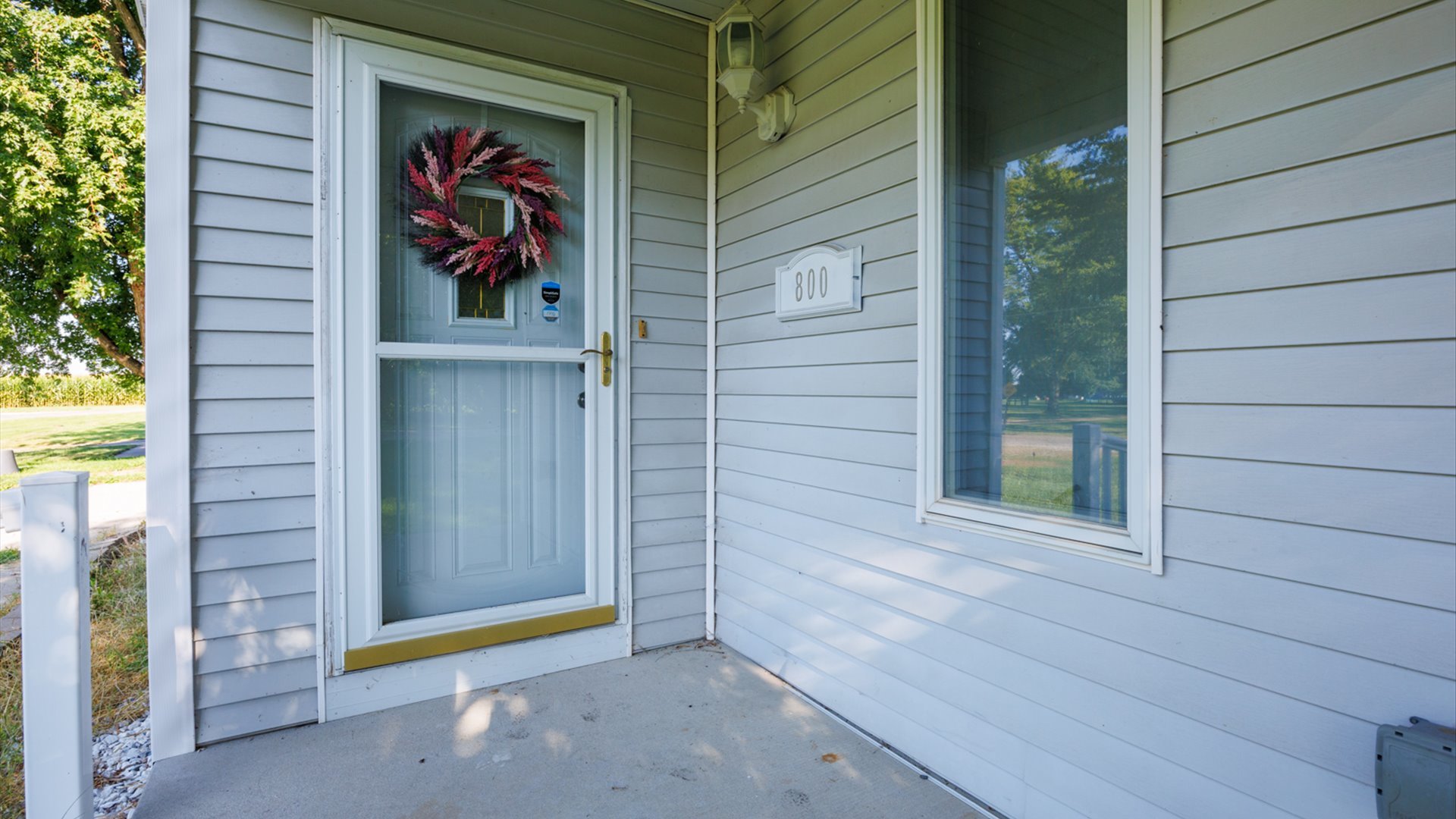 800 West Hamilton Street Atlanta, IL 61723 - Photo 3 of 44 a view of a door and a window