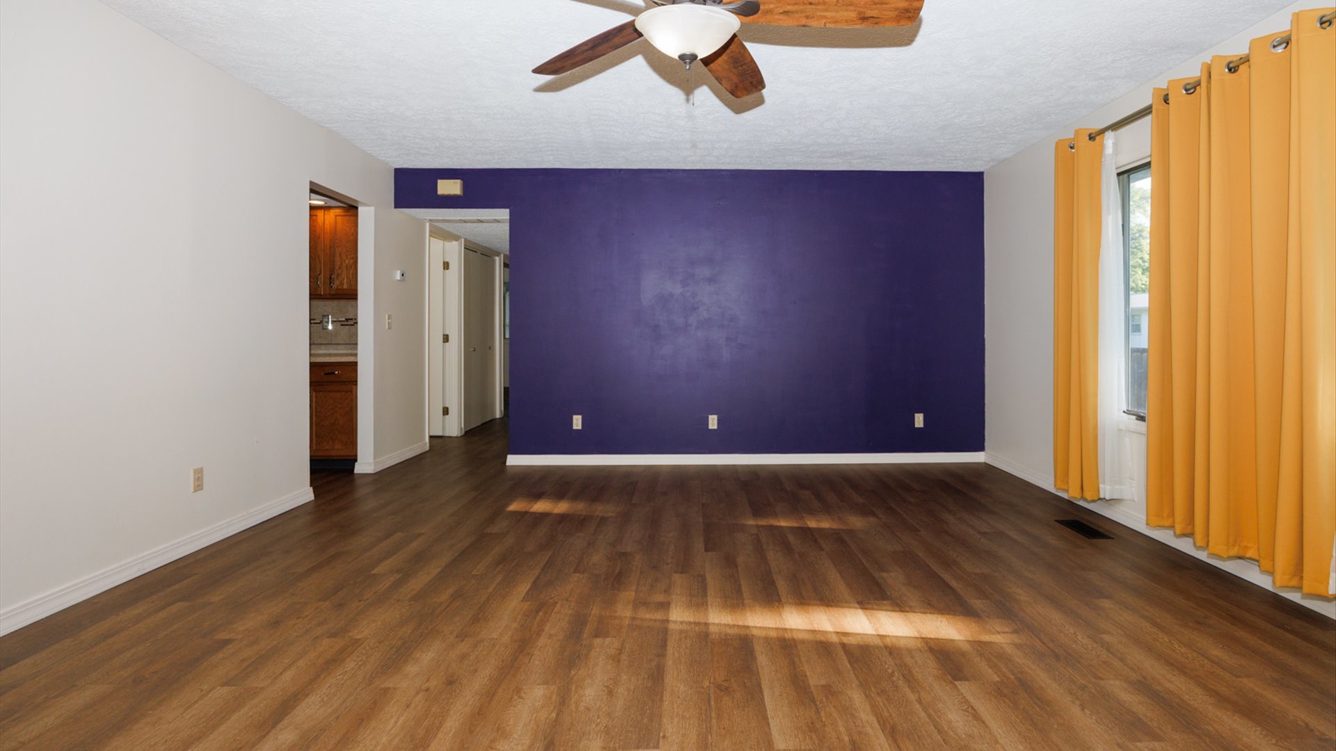 800 West Hamilton Street Atlanta, IL 61723 - Photo 5 of 44 wooden floor in an empty room with a window