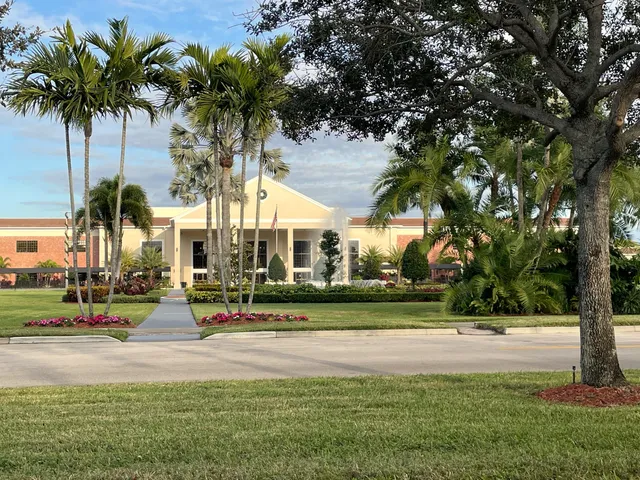 a view of street with houses and trees