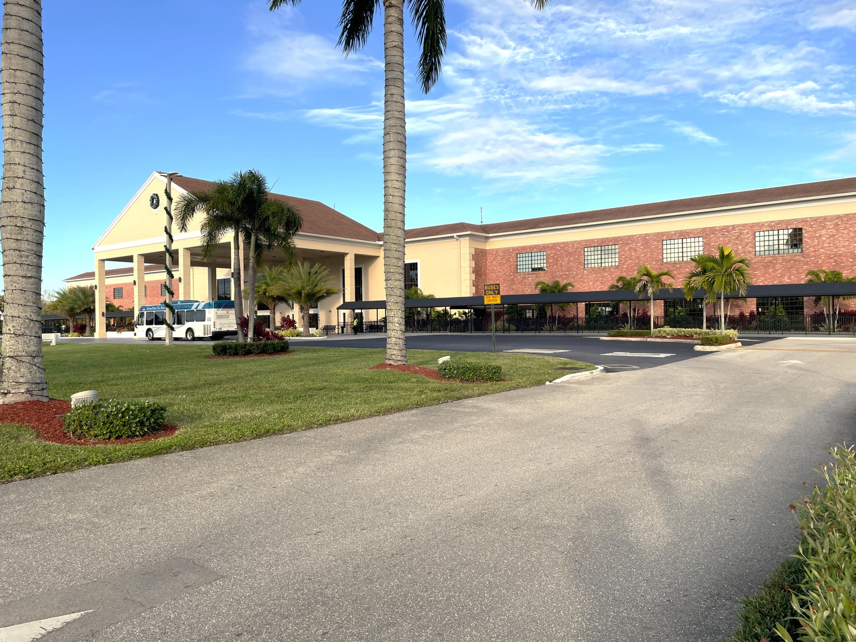 1020 Exeter, Unit 1020 Boca Raton, FL 33434 - Photo 26 of 29 a view of a street with houses