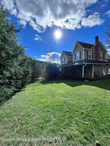 a house view with a garden space