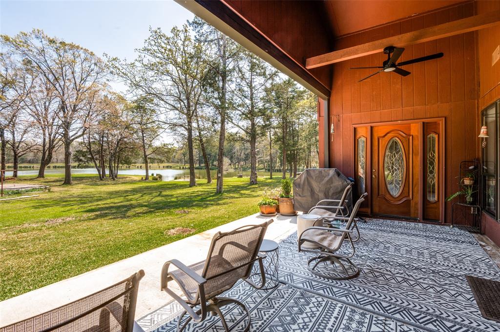 182 Huts Crossing Sadler, TX 76264 - Photo 22 of 40 a view of a swimming pool with chair and tables