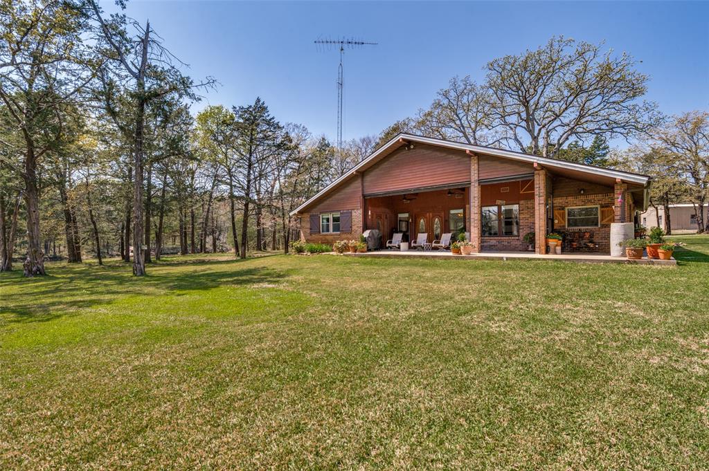 182 Huts Crossing Sadler, TX 76264 - Photo 23 of 40 a front view of house with yard