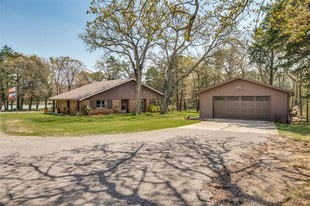 182 Huts Crossing Sadler, TX 76264 - Photo 3 of 40 a house with yard in front of it