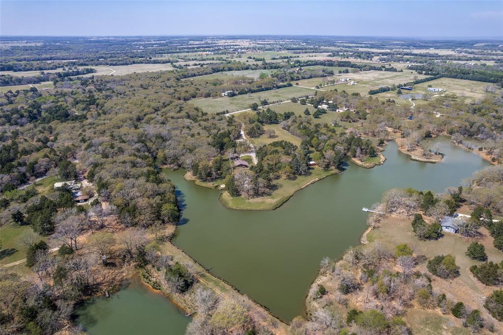 182 Huts Crossing Sadler, TX 76264 - Photo 38 of 40 a view of a lake with a mountain