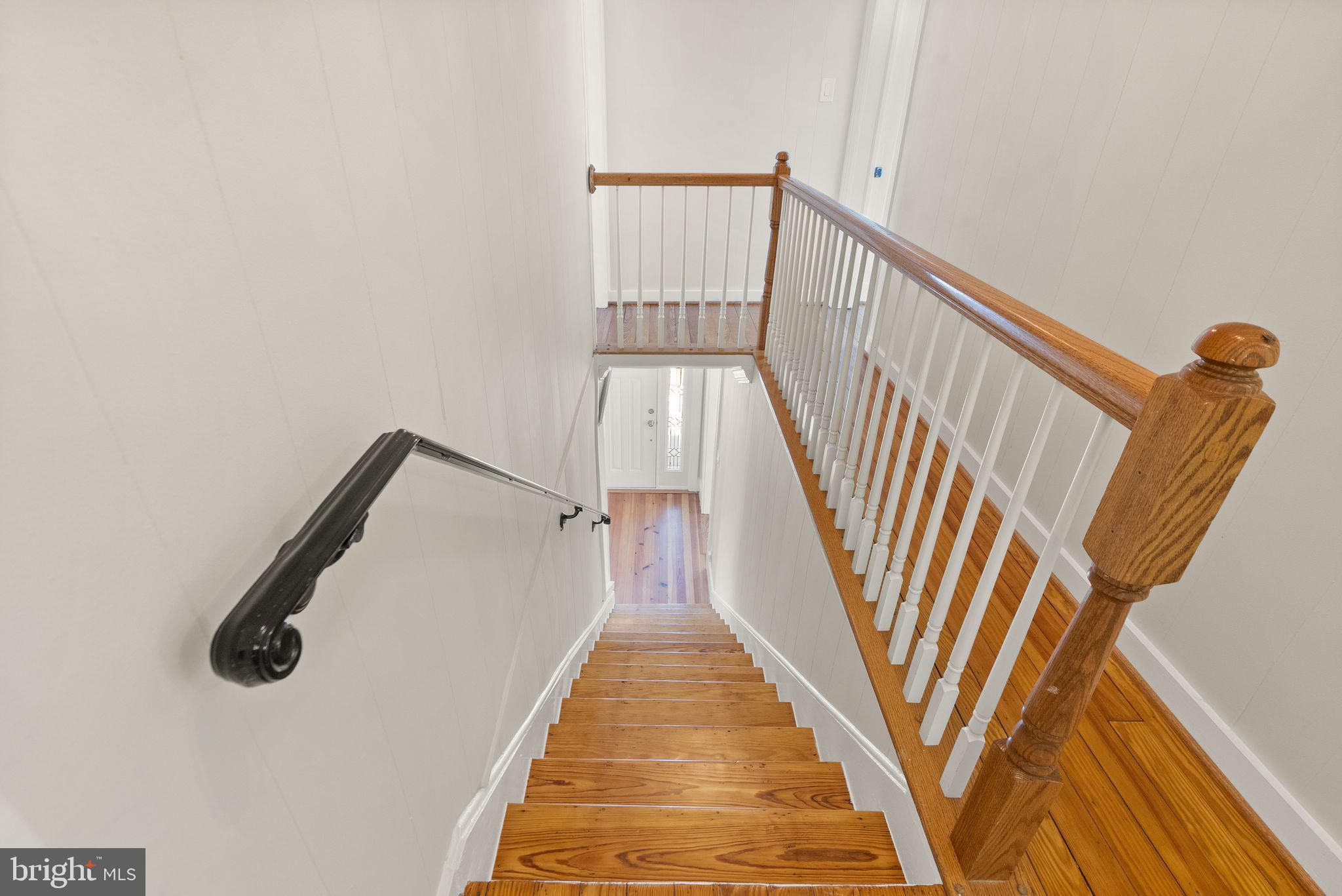 37151 Branchriver Road Purcellville, VA 20132 - Photo 30 of 63 a view of staircase with railing and white walls