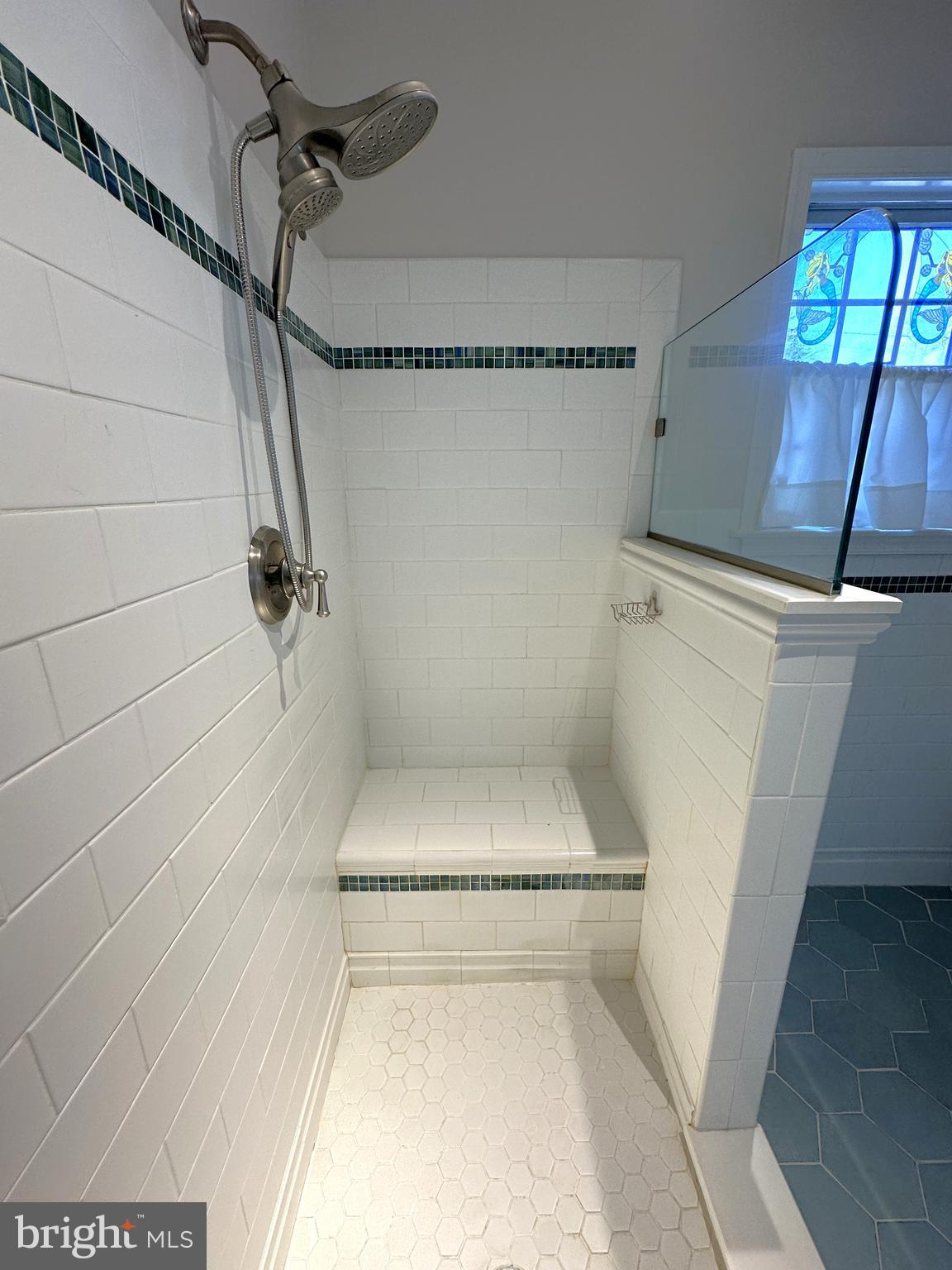 21 Big Road Schwenksville, PA 19473 - Photo 19 of 61 a bathroom with a white bath tub and a shower