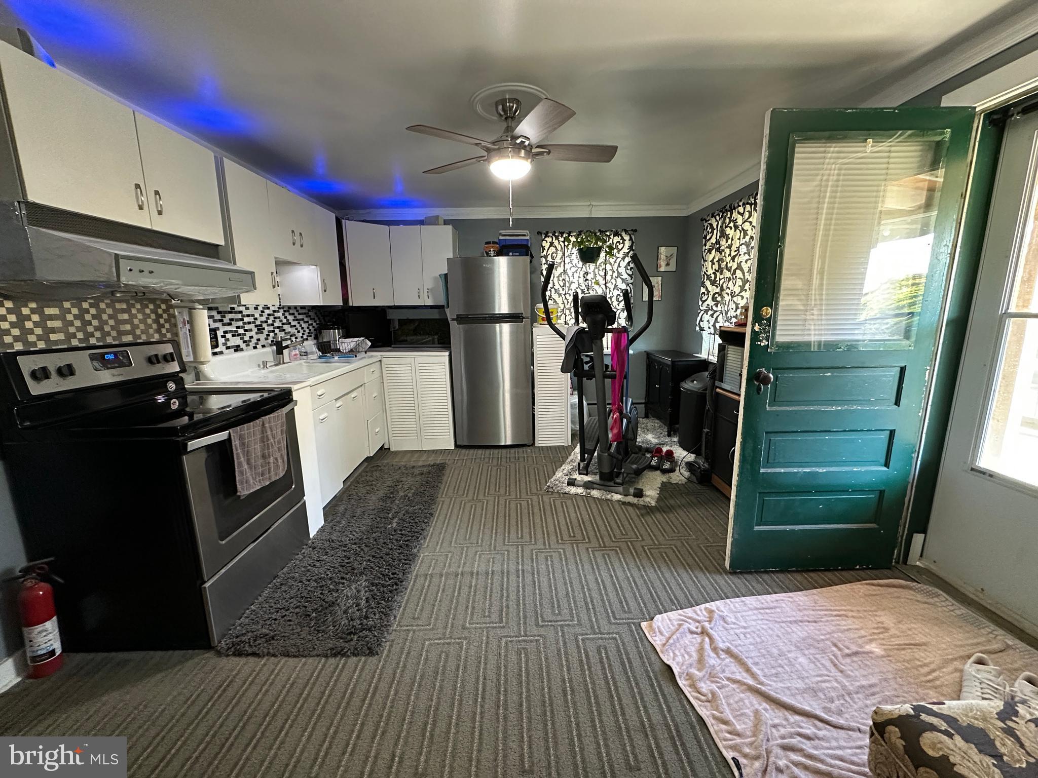 21 Big Road Schwenksville, PA 19473 - Photo 37 of 61 a kitchen with refrigerator and cabinets