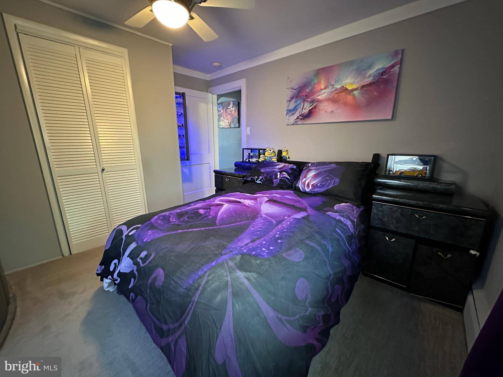 21 Big Road Schwenksville, PA 19473 - Photo 44 of 61 a bedroom with a bed and a chandelier