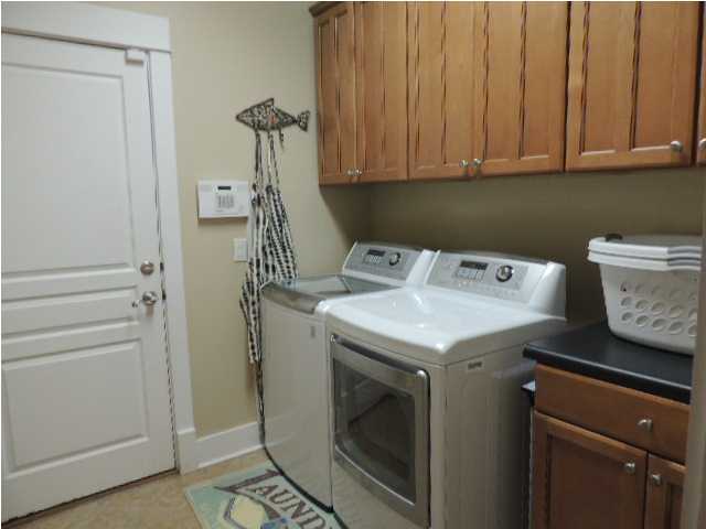 182 Preston Path Santa Rosa Beach, FL 32459 - Photo 13 of 32 a utility room with dryer and washer