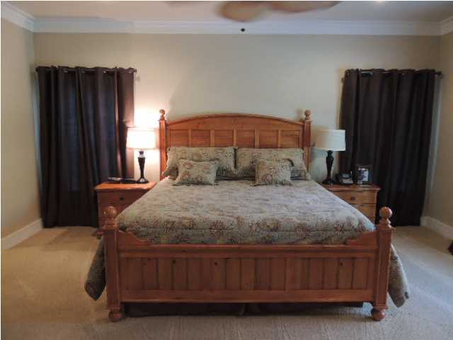 182 Preston Path Santa Rosa Beach, FL 32459 - Photo 14 of 32 a bedroom with a bed and a dresser