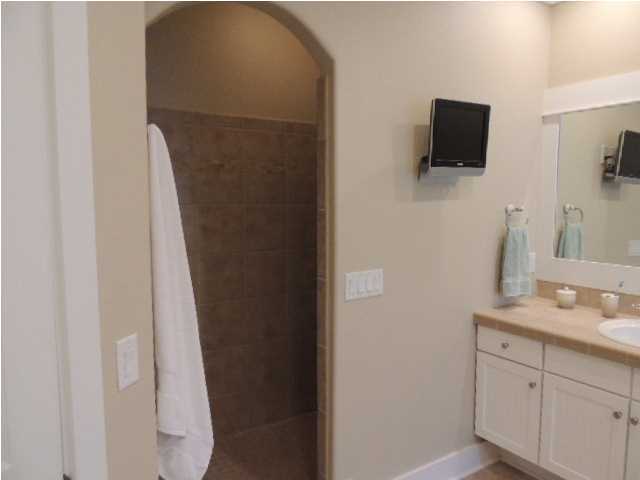 182 Preston Path Santa Rosa Beach, FL 32459 - Photo 18 of 32 a bathroom with a sink and a mirror