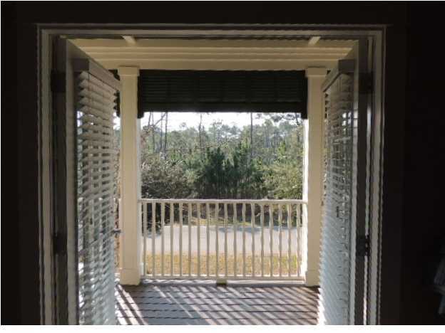 182 Preston Path Santa Rosa Beach, FL 32459 - Photo 24 of 32 a view of a wooden door and a window