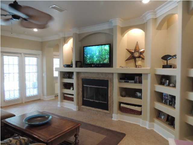 182 Preston Path Santa Rosa Beach, FL 32459 - Photo 5 of 32 a living room with furniture and a fireplace
