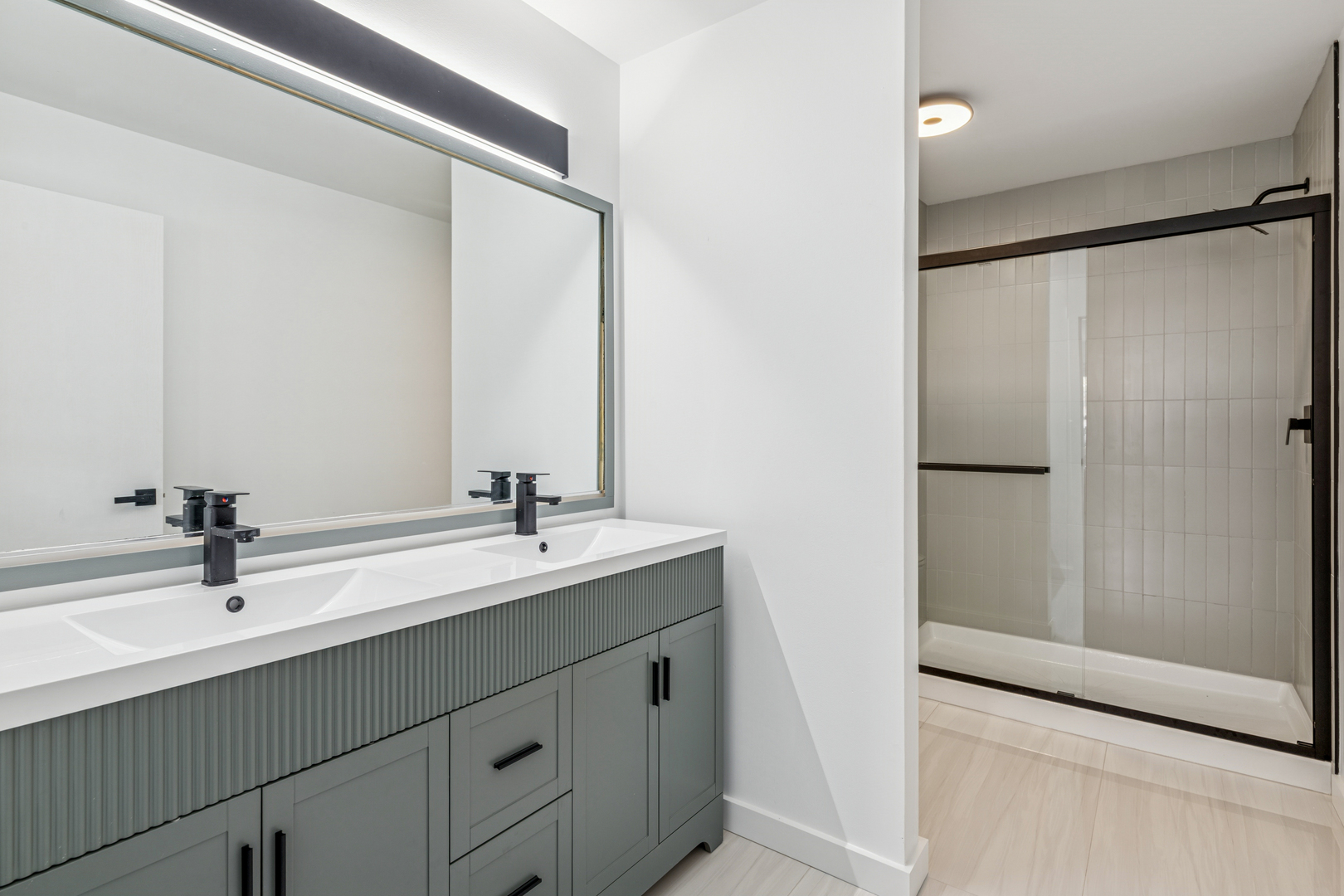 1240 Winfield Court, Unit 3 Roselle, IL 60172 - Photo 11 of 21 a bathroom with a double vanity sink and mirror