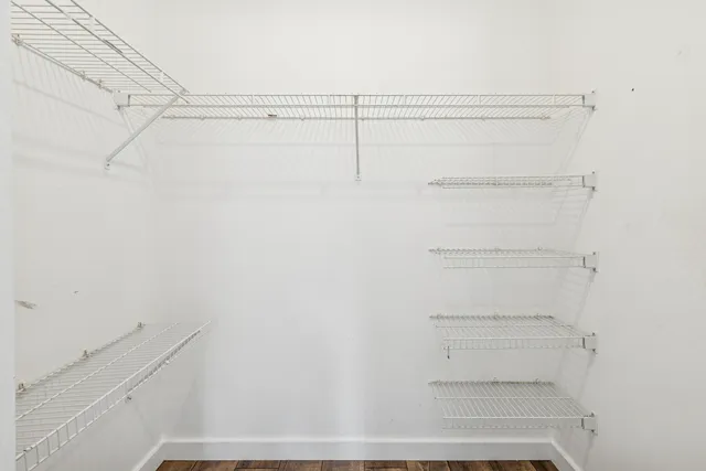 a view of a room with racks on the wall