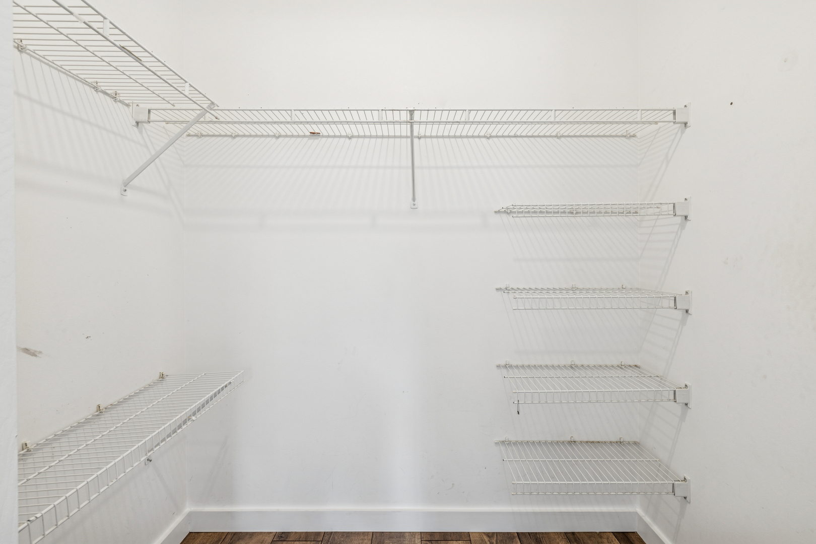 1240 Winfield Court, Unit 3 Roselle, IL 60172 - Photo 12 of 21 a view of a room with racks on the wall