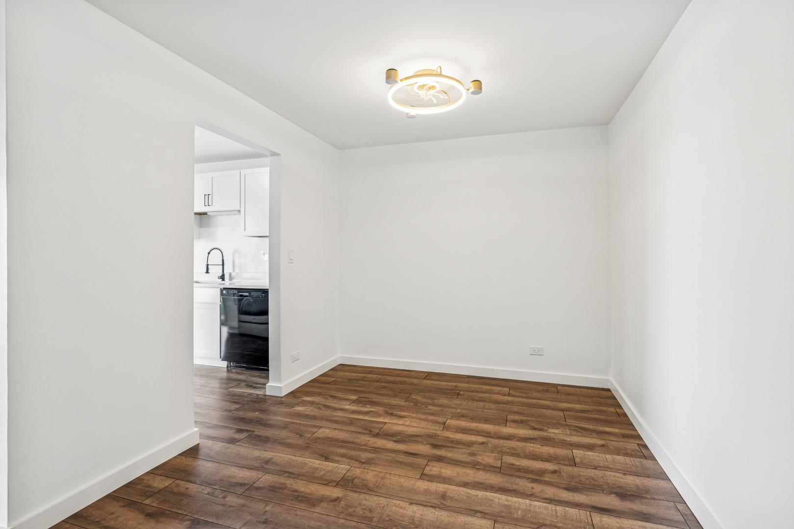 1240 Winfield Court, Unit 3 Roselle, IL 60172 - Photo 5 of 21 a view of empty room with wooden floor